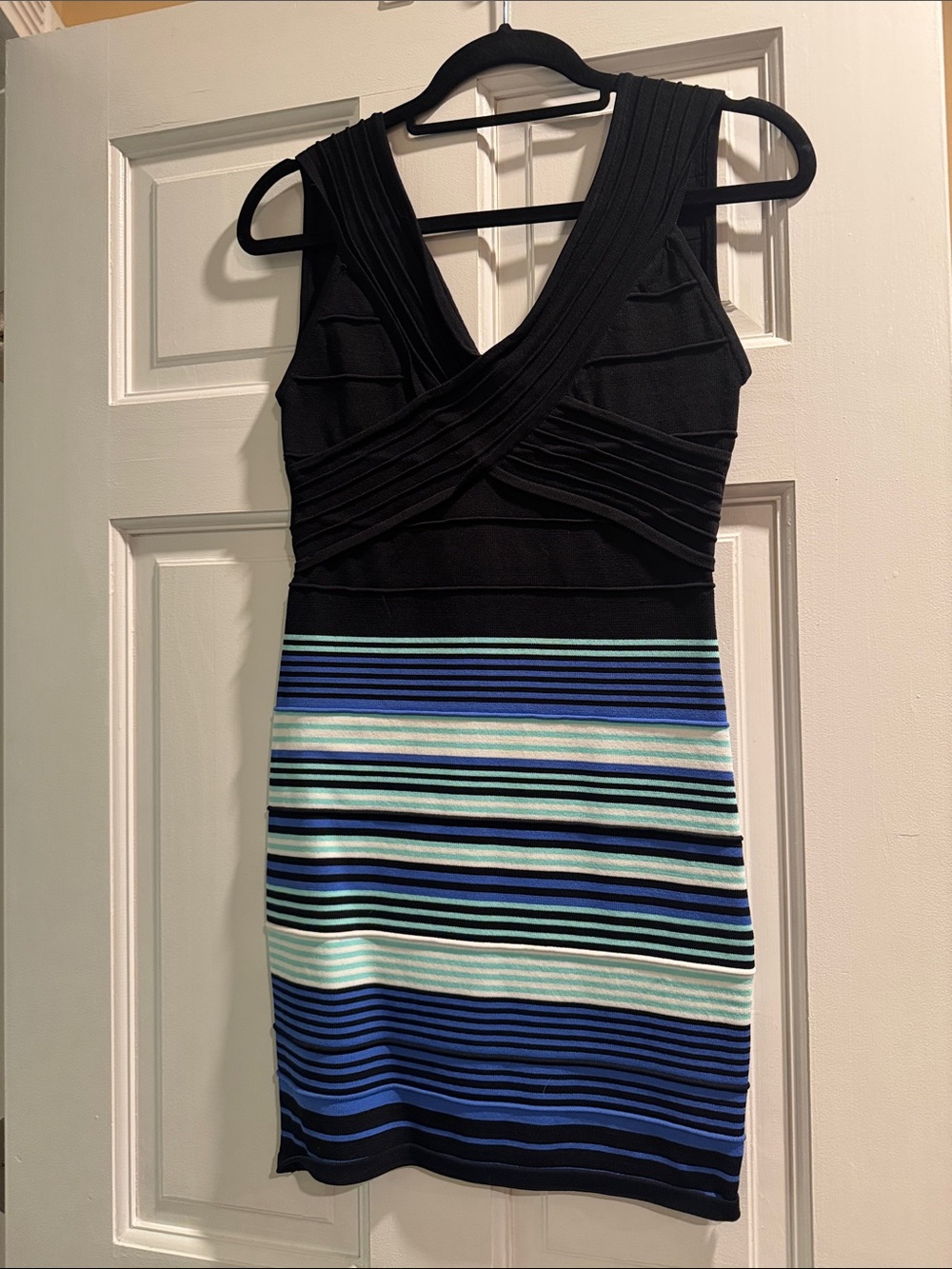 Ladies size medium Sleeveless Black & Blue Striped Dress.